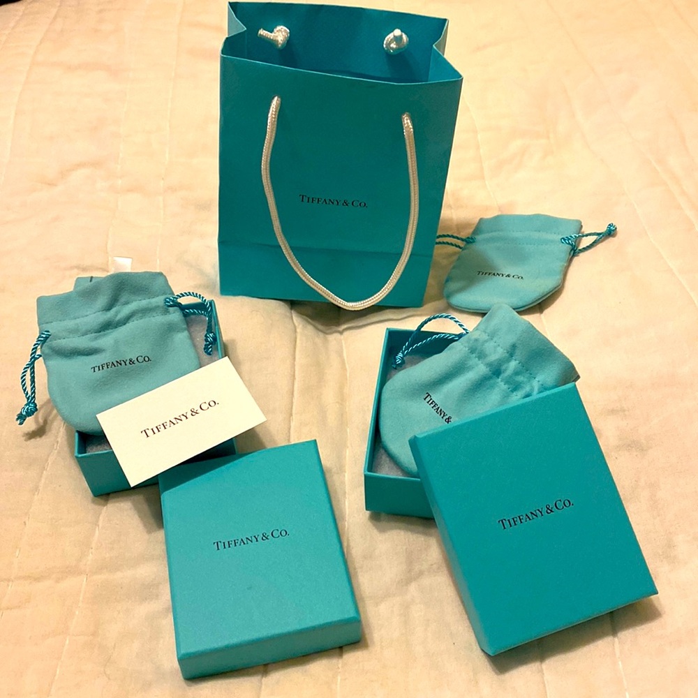 Lot of Tiffany’s boxes and dust bags, shopping sack